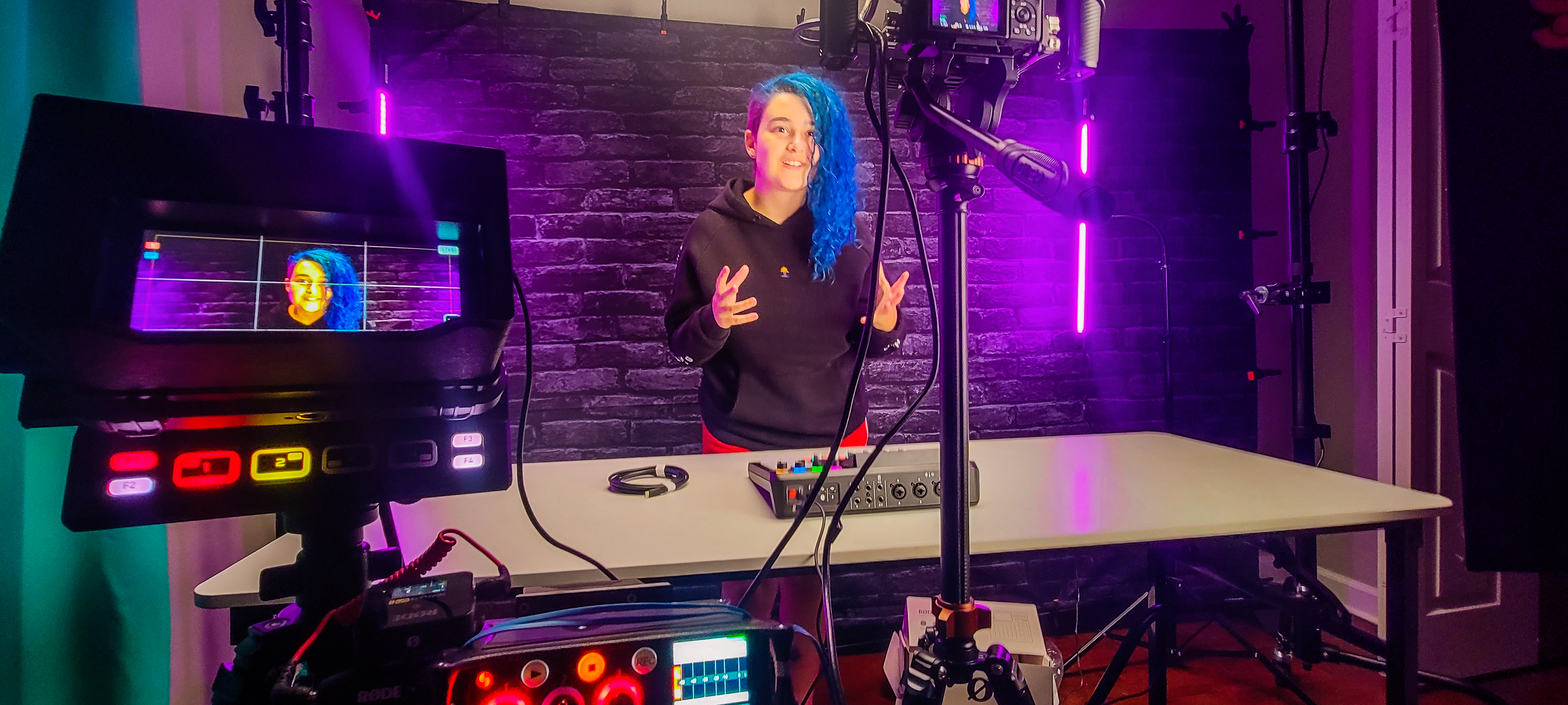 Fabu filming an unboxing or product segment in the studio setup