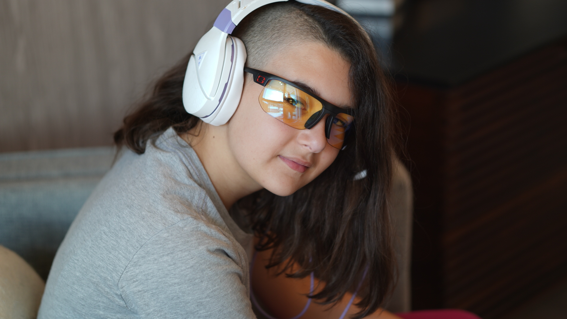 Fabu wearing gaming headphones and GUNNAR glasses for a brand collaboration portrait